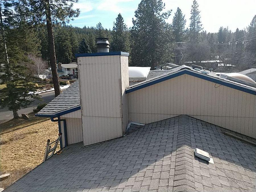 What is the average cost of a new shingle roof in Spokane?