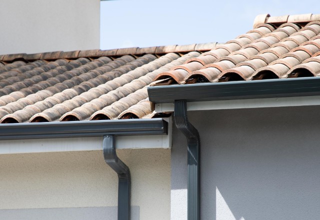 Durable seamless gutters provide efficient drainage and long-lasting protection for your home