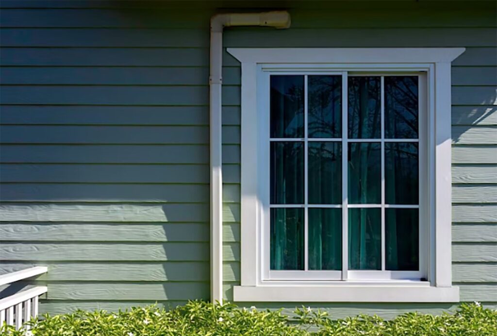 Image of a home with various windows, highlighting the need to consider many factors when selecting replacement windows.