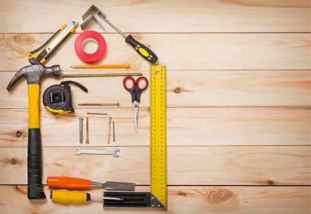 An image depicting the various tools and materials required to prepare for installing a metal roof on your shed safely and correctly