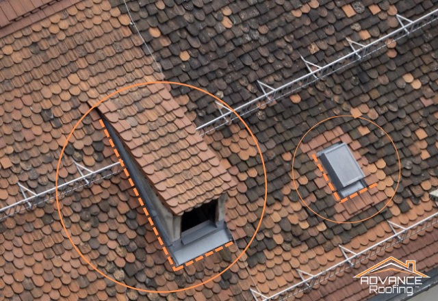 Aerial view of a tiled roof with areas highlighted to indicate roof flashing repair work. The highlighted sections include step flashing around a dormer window,