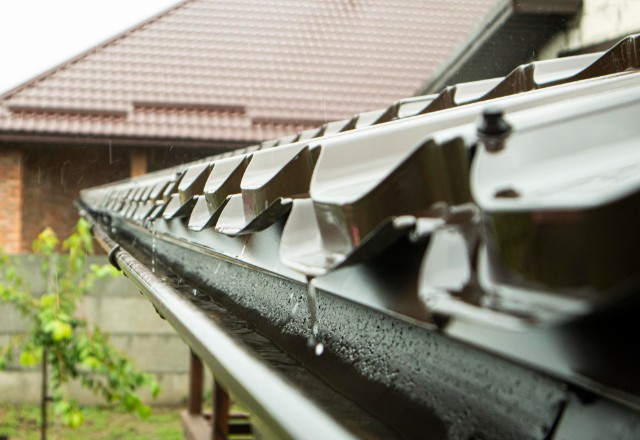  Clogged gutters overflowing during storms, potentially leading to water entering
through the roof and causing damage inside the home .