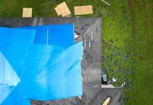 How to Put a Tarp on a Roof: Temporary Roof Leak Repair Guide - Advance