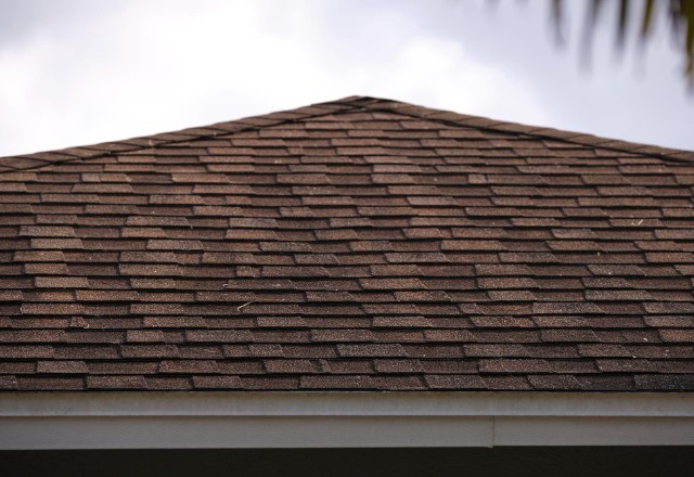 A selection of asphalt shingles for use in roof installation projects.