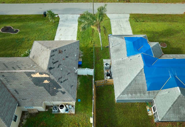 Photo of two houses side by side: Comparison between intact and damaged rooftops,
demonstrating why repair or replacement is necessary when left unchecked.