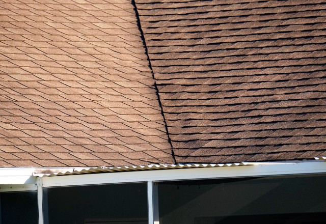 A picture of designer/luxury shingles - Designer/luxury shingles provide an
aesthetically pleasing look while also offering increased durability in extreme weather
conditions.