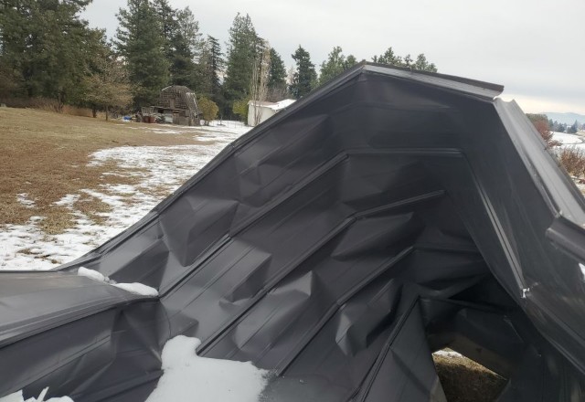 Portfolio of Advance Roofing LLC: a roof blown off and damaged by storm in urgent need of replacement