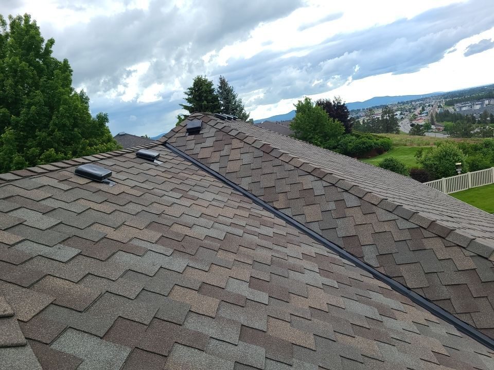 Professional roof replacement in Spokane by expert contractors, focusing on critical areas like valleys.